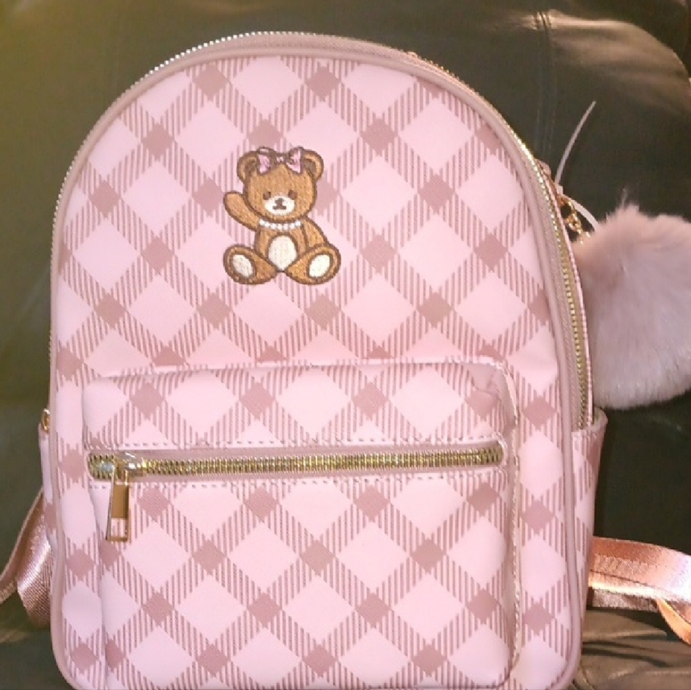 !!NEW!!
Tween Girl, Pink Checkered Backpack. Never Been Used. Brand New!